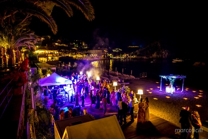 Wedding cake and after party on the beach at Belmond Villa Sant'Andrea Taormina Mare